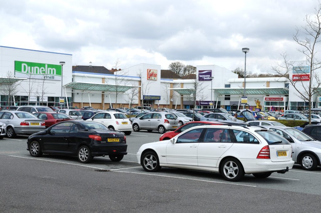 Turner Rise Retail Park car park with the Dunelm, Carpetright and Bensons for Beds units