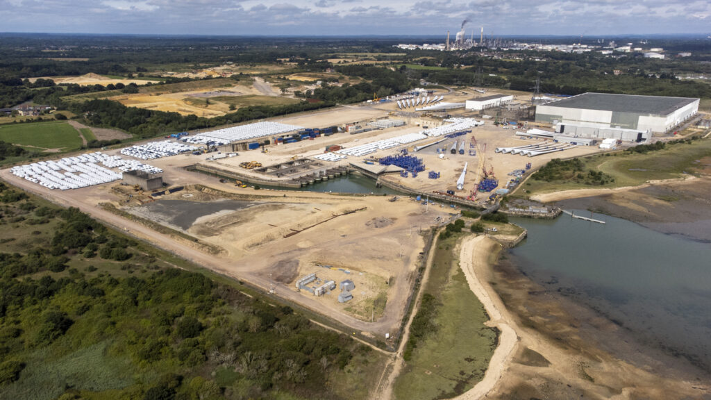 Aerial view of the Fawley Waterside site showing dock basin construction beside the estuary
