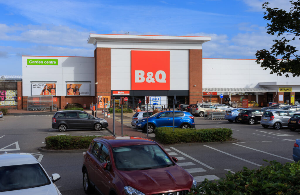 B&Q Trimdon Street store frontage with garden centre entrance and a busy car park