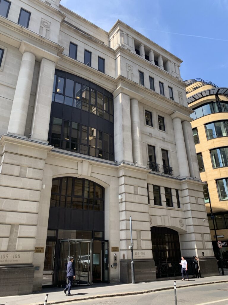 Entrance facade of Pinners Hall, 105-108 Old Broad Street, London, with its stone columns and arched doorway