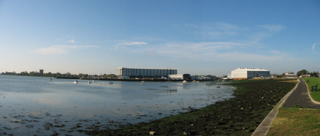 View across the harbour towards existing dockyard buildings near the Trafalgar Wharf site in Portsmouth