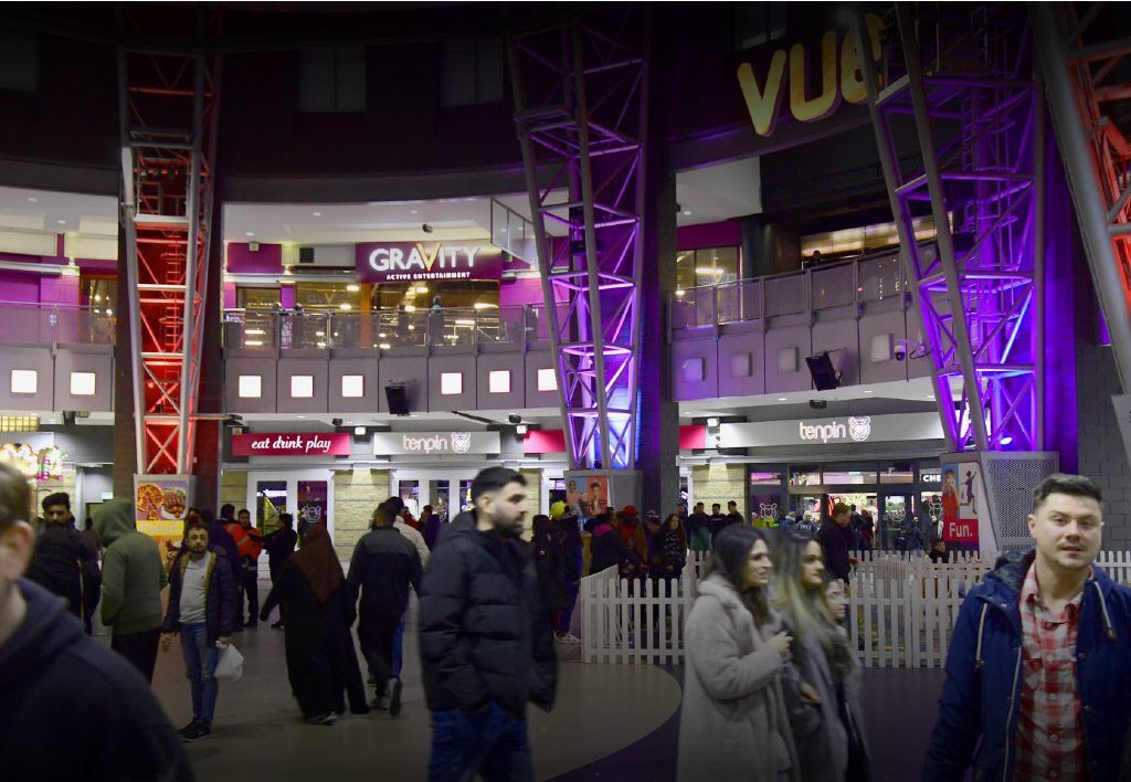 Star City atrium lit at night, with the Vue, Gravity and Tenpin venues