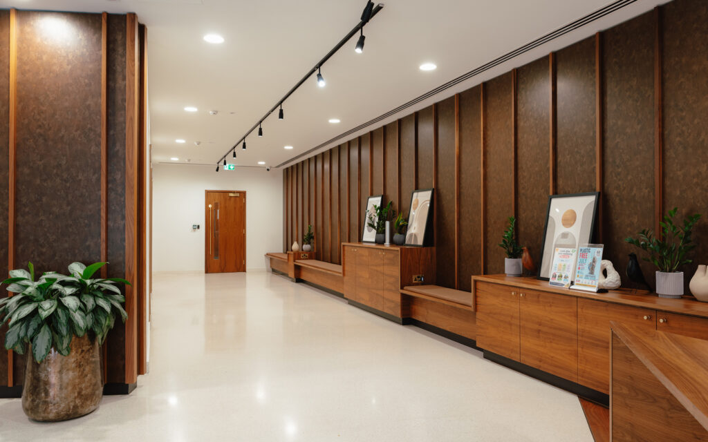 Timber sideboard and tenant directory board in the reception at 6 Gracechurch Street